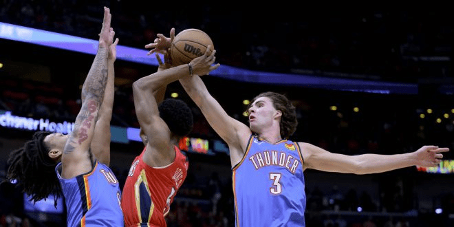 Josh Giddey a Jaylin Williams contesting a shot against New Orleans in the Play-In win. Image via ESPN WRUF