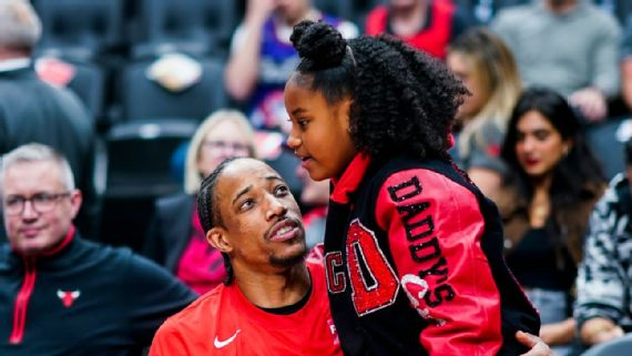 Diar DeRozan with father DeMar, image via ESPN 